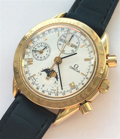 solid gold omega speedmaster.